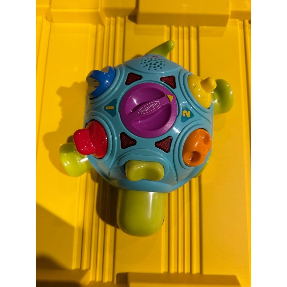 Infantino Tinkerback Turtle developmental activity toy.